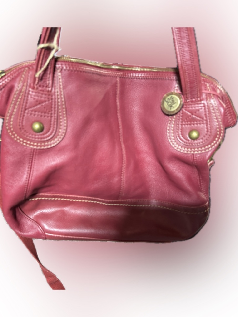 P028- The sak Classic Red Leather Shoulder Bag with brass accents
